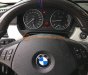 BMW 3 Series 320i 2009 - Xe BMW 3 Series 320i năm 2009, màu đỏ, xe nhập