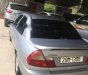 Mitsubishi Lancer 2000 - Cần bán Mitsubishi Lancer đời 2000, màu bạc