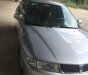 Mitsubishi Lancer 2000 - Cần bán Mitsubishi Lancer đời 2000, màu bạc