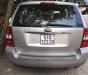 Kia Carnival 2011 - Bán Kia Carnival đời 2011, màu bạc  