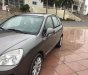 Kia Carens 20MT 2011 - Bán xe cũ Kia Carens 20MT đời 2011, màu xám