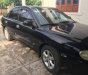 Kia Spectra   2004 - Bán xe cũ Kia Spectra đời 2004, màu đen, 175 triệu