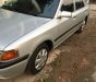 Mazda 323   1995 - Bán xe cũ Mazda 323 đời 1995, màu bạc xe gia đình