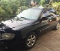 Kia Spectra   2004 - Bán xe cũ Kia Spectra đời 2004, màu đen, 175 triệu