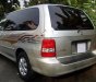 Kia Carnival GS 2006 - Cần bán gấp Kia Carnival GS đời 2006, màu bạc số sàn