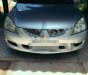 Mitsubishi Lancer AT 2003 - Bán xe Mitsubishi Lancer AT đời 2003, màu bạc số tự động