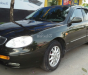 Daewoo Leganza 2001 - Cần bán gấp Daewoo Leganza năm 2001 màu đen, 115 triệu, xe nhập