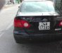 Toyota Corolla J 2003 - Bán xe Toyota Corolla J đời 2003, màu đen số sàn