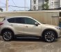 Mazda CX 5 2.5AT 2WD 2017 - Cần bán Mazda CX 5 2.5AT 2WD đời 2017, màu vàng 