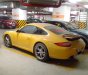 Porsche 911 Carrera 2008 - Bán xe thể thao Porsche 911 Carrera đời 2008, màu vàng cực đẹp rất ít đi