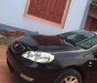 Toyota Corolla altis 1.8MT 2003 - Bán ô tô Toyota Corolla Altis 1.8MT đời 2003, màu đen còn mới