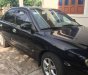 Kia Spectra   MT 2004 - Chính chủ bán Kia Spectra MT sản xuất 2004, màu đen