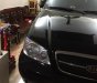 Kia Carnival GS 2006 - Bán Kia Carnival GS đời 2006, màu đen như mới, giá 255tr