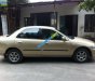 Mazda 323 1997 - Bán Mazda 323 đời 1997, màu vàng, nhập khẩu, giá 85tr