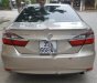 Toyota Camry 2.0 2015 - Bán Toyota Camry 2.0 năm 2015, màu vàng đẹp như mới, 930 triệu