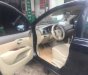 Nissan Grand livina 2011 - Bán Nissan Grand livina đời 2011, màu đen, 310tr