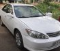 Toyota Camry LE XLE 2003 - Camry XLE đời 2003 nhập khẩu nguyên chiếc chính hãng Mỹ, 5 chỗ, số tự động, màu trắng, 100km/9 lít