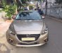 Mazda 3 2016 - Bán chiếc Mazda 3 2016 sedan dáng thể thao màu vàng cát