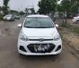 Hyundai Grand i10 2015 - Cần bán xe Hyundai Grand i10 đời 2015, màu trắng xe gia đình, 350 triệu