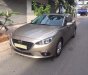 Mazda 3 2016 - Bán chiếc Mazda 3 2016 sedan dáng thể thao màu vàng cát