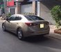 Mazda 3 2016 - Bán chiếc Mazda 3 2016 sedan dáng thể thao màu vàng cát