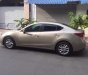 Mazda 3 2016 - Bán chiếc Mazda 3 2016 sedan dáng thể thao màu vàng cát