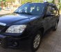 Mazda Tribute 2009 - Cần bán lại xe Mazda Tribute 2009, màu đen, nhập khẩu nguyên chiếc số tự động