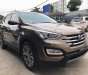 Hyundai Santa Fe 4WD 2014 - Cần bán lại xe Hyundai Santa Fe 4WD sản xuất 2014, màu nâu, giá chỉ 980 triệu