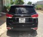 Kia Rondo   2014 - Bán Kia Rondo đời 2014, màu đen số tự động