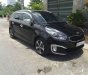 Kia Rondo   2014 - Bán Kia Rondo đời 2014, màu đen số tự động