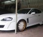 Hyundai Tuscani   2005 - Bán Hyundai Tuscani năm 2005, màu trắng, nhập khẩu nguyên chiếc