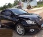 Chevrolet Cruze  1.6 LS 2014 - Bán Chevrolet Cruze 1.6 LS đời 2014, màu đen số sàn, giá tốt