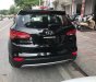 Hyundai Santa Fe 2.4L 4WD 2014 - Bán xe Hyundai Santa Fe 2.4L 4WD đời 2014, màu đen, xe nhập