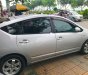 Toyota Prius 1.5 2010 - Cần bán gấp Toyota Prius 1.5 đời 2010, màu bạc, nhập khẩu, 600tr