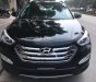 Hyundai Santa Fe 2.4L 4WD 2014 - Bán xe Hyundai Santa Fe 2.4L 4WD đời 2014, màu đen, xe nhập