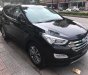 Hyundai Santa Fe 2.4L 4WD 2014 - Bán xe Hyundai Santa Fe 2.4L 4WD đời 2014, màu đen, xe nhập