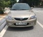 Mazda 323 Classic GLX 2003 - Chính chủ bán Mazda 323 Classic GLX đời 2003, màu vàng