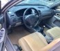 Mazda 323 Classic GLX 2003 - Chính chủ bán Mazda 323 Classic GLX đời 2003, màu vàng