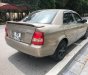 Mazda 323 Classic GLX 2003 - Chính chủ bán Mazda 323 Classic GLX đời 2003, màu vàng