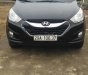 Hyundai Tucson 2.0 AT 4WD 2011 - Bán Hyundai Tucson 2.0 AT 4WD 2011, màu đen, nhập khẩu