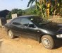 Mazda 323 1.6 MT 1998 - Bán xe Mazda 323 1.6 MT năm 1998, màu đen