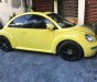 Volkswagen Beetle MT 2005 - Cần bán Volkswagen Beetle MT đời 2005, màu vàng số sàn giá cạnh tranh