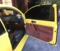 Volkswagen Beetle MT 2005 - Cần bán Volkswagen Beetle MT đời 2005, màu vàng số sàn giá cạnh tranh