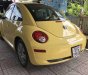 Volkswagen Beetle 2009 - Cần bán gấp Volkswagen Beetle đời 2009, màu vàng, giá chỉ 550 triệu