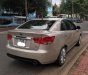 Kia Forte SX 2010 - Cần bán lại xe Kia Forte SX đời 2010, màu vàng