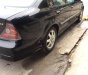 Daewoo Magnus 2.0 MT 2004 - Bán Daewoo Magnus 2.0 MT đời 2004, màu đen như mới, 178 triệu