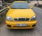 Daewoo Lanos 2002 - Bán Daewoo Lanos đời 2002, màu vàng