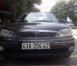 Ford Laser  Ghina 1.8 2002 - Bán Ford Laser Ghina 1.8 đời 2002, màu đen