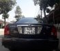 Ford Laser  Ghina 1.8 2002 - Bán Ford Laser Ghina 1.8 đời 2002, màu đen