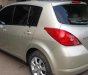 Nissan Tiida 1.8AT 2009 - Bán Nissan Tiida 1.8AT đời 2009, màu vàng, xe nhập